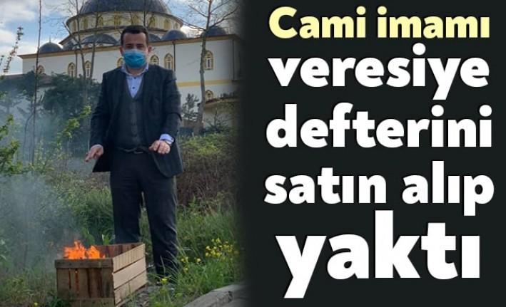 Başiskele Barbaros Camii İmami Kadir Çelikiz, mahalle bakkalındaki veresiye defterini