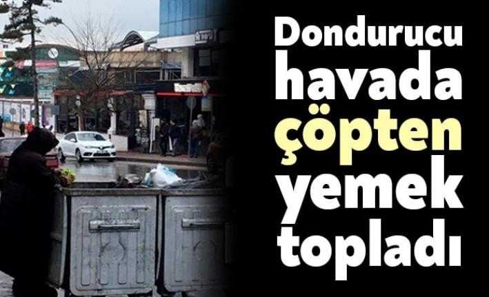 Dondurucu soğuklarda karnını doyuramayan bir vatandaş çöpten yiyecek topladı.