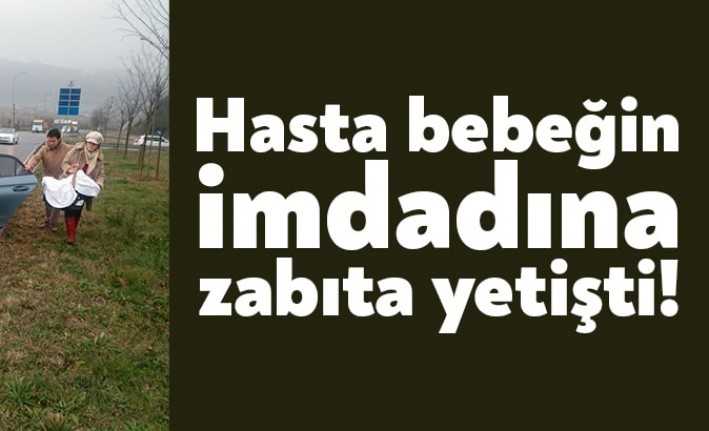 KOÜ'ye muayene için hasta bebeklerin götüren bir aile yolda