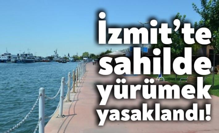 İzmit Kaymakamı Şevken Cinbir bakanlık genelgesi gereği sahilde yürümenin ve