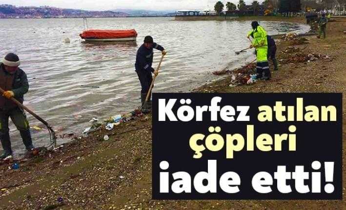 Başiskele sahilinde, Körfez'e atılan ve dalgalarla kıyıya vuran çöpler temizlendi.