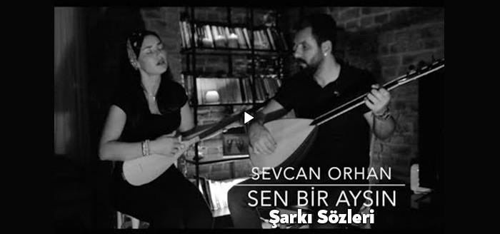 Sevcan Orhan Sen Bir Aysın Şarkı Sözleri müzikseverlerin beğenisine sunuldu.