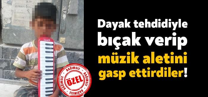İzmit'te bir sokak müzisyeninden melodika gasp eden 18 yaşından küçük