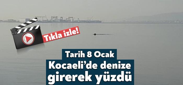 Kocaeli’nin Başiskele sahilinde bir vatandaş yaz ayındaymış gibi denize girerek