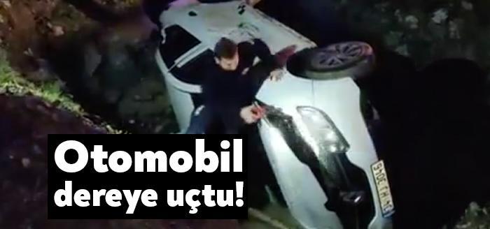 Gebze'de  dereye devrilen otomobilin sürücüsü yaralandı. Sürücü Kocaeli itfaiyesinin yardımıyla