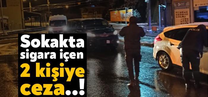 Kocaeli'de yoğun kar yağışına rağmen ara verilmeyen denetimlerde sokakta sigara