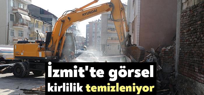 İzmit Belediyesi kent genelinde metruk ve hasarlı binalarla ilgili çalışmalarına
