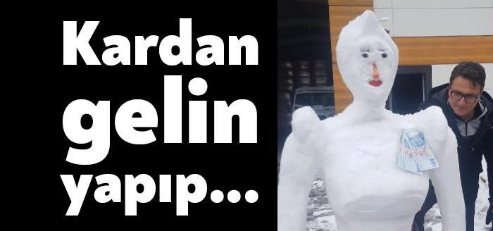 İzmit'te bir iş yerinin çalışanları kardan gelin yaptı. Çalışanlar kardan