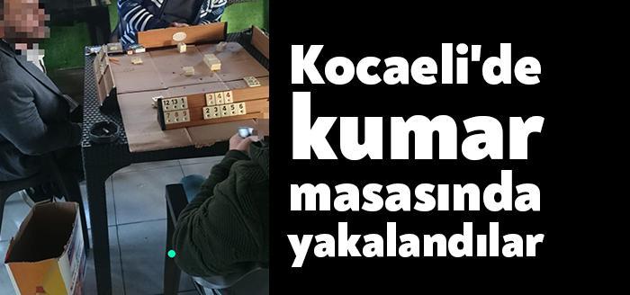 İzmit’te şahısların sokağa çıkma yasağını ihlal ederek bir işletmede oyun
