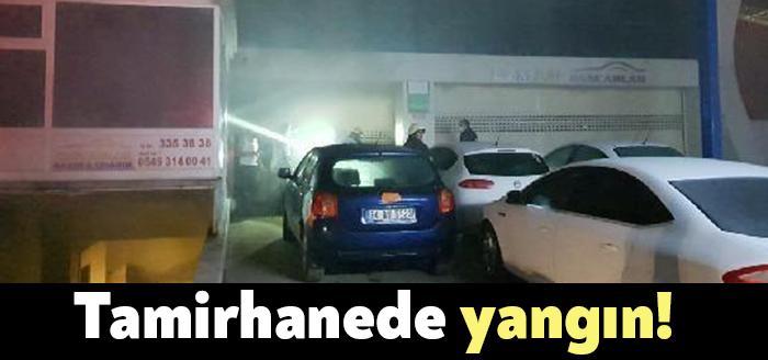 İzmit'te bir tamirhanede çıkan yangında araçlar, iş yerinin kepenkleri kesilerek