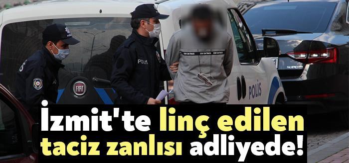 İzmit Alemdar Caddesi üzerinde yolda yürüyen genç bir kadının fotoğrafını