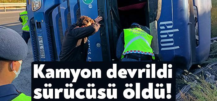 Kocaeli'nin Gebze ilçesinde, kontrolden çıkarak kavşakta devrilen kamyonun altında kalan sürücü