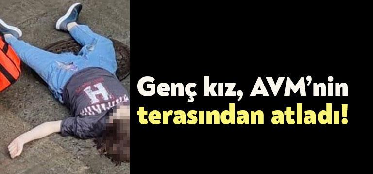 Kocaeli’de bulunan bir AVM’nin terasına çıkan genç kız, kendini metrelerce