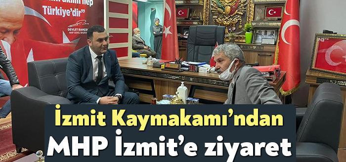 İzmit Kaymakamı Yusuf Ziya Çelikkaya, MHP İzmit İlçe Başkanı Kemal