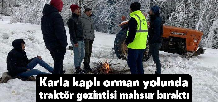Karamürsel'de karla kaplı orman yolunda traktör ile gezintiye çıkan 3