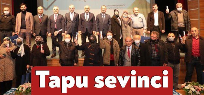 İmar şuyulandırma çalışmalarının tamamlandığı Mollafenari’de hak sahiplerine tapuları düzenlenen törenle