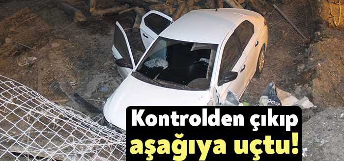 Kocaeli'nin Başiskele ilçesinde kontrolden çıkan otomobil kütüklerin istiflendiği alana uçtu.