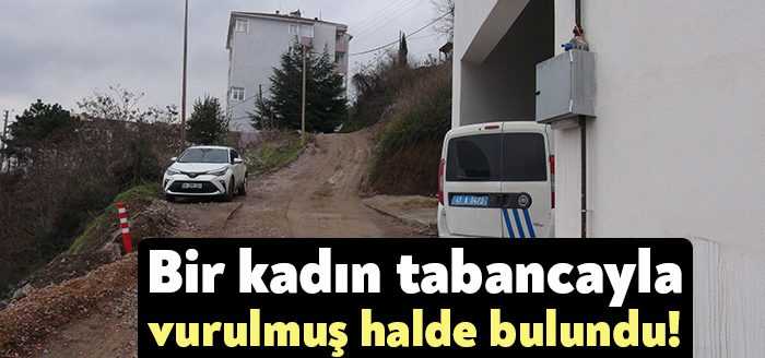 Kocaeli'de 41 yaşındaki kadın, evinde tabancayla karnından vurulmuş halde bulundu.