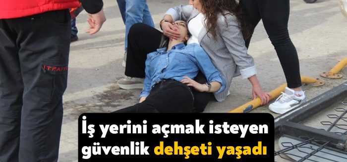 Kocaeli'nin İzmit ilçesindeki teknoloji mağazasında çalışan kadın güvenlik görevlisinin üzerine