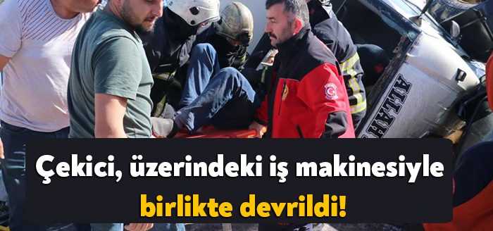Kocaeli'de freni tutmayan çekici, üzerindeki iş makinesiyle birlikte devrildi. İş