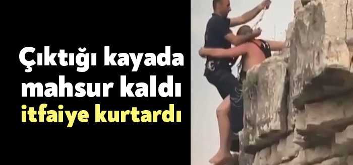 Kocaeli’nin Kandıra ilçesinde denize atlamak için 20 metrelik kayaya tırmanan