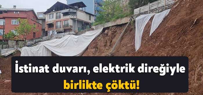 İzmit'te bir istinat duvarı, üzerindeki yolda bulunan elektrik direğiyle birlikte