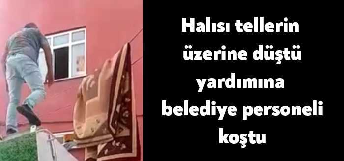 Kocaeli'de balkona asılan halı, 5. kattan telefon kablosunun üzerine düştü.
