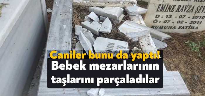 Kocaeli'nin Darıca ilçesinde 2'si yetişkin 5'i bebek mezarının taşları balyozlarla