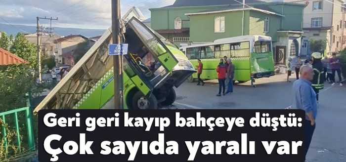 Kocaeli'de rampada geri kayan halk otobüsü, başka otobüse çarpıp bahçeye