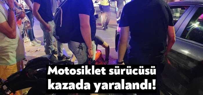 Kocaeli’nin İzmit ilçesinde aniden otomobilin önüne çıkan motosiklet sürücüsü, çarpışma