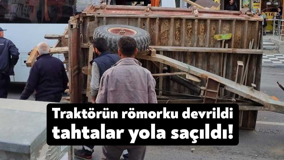 Kocaeli'de sokaktan caddeye dönüş yapan traktörün römorku devrildi. Römorktan saçılan
