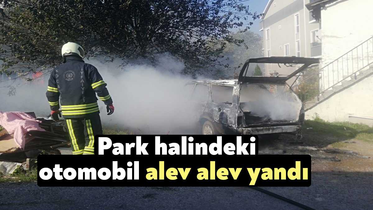 Kocaeli'de park halindeki otomobilde çıkan yangın itfaiye ekiplerinin müdahalesiyle söndürülürken,
