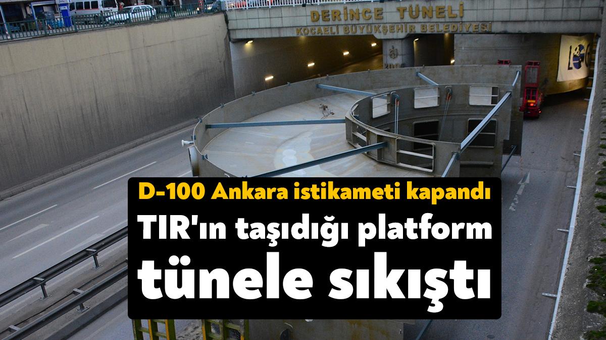 Kocaeli'de Derince Tüneli'nin girişinde tırın taşıdığı platformun tünele sıkışması sebebiyle