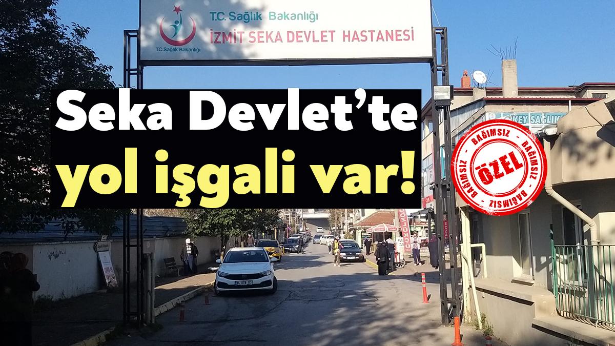 İzmit Seka Devlet Hastanesi’nin girişinde yayalar ve ambulanslar giriş çıkışlarda