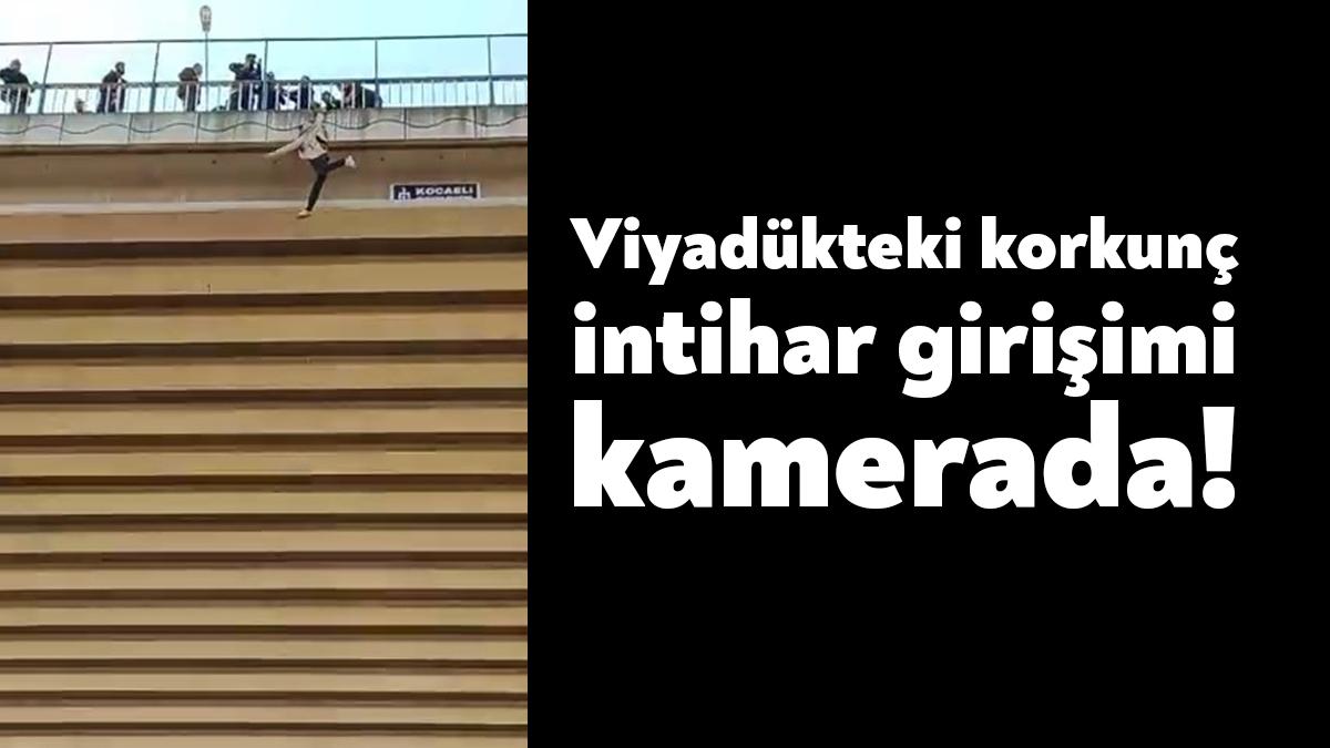 Kocaeli'nin Derince ilçesinde viyadüğün korkuluklarına çıkan ve bir süre aşağıya