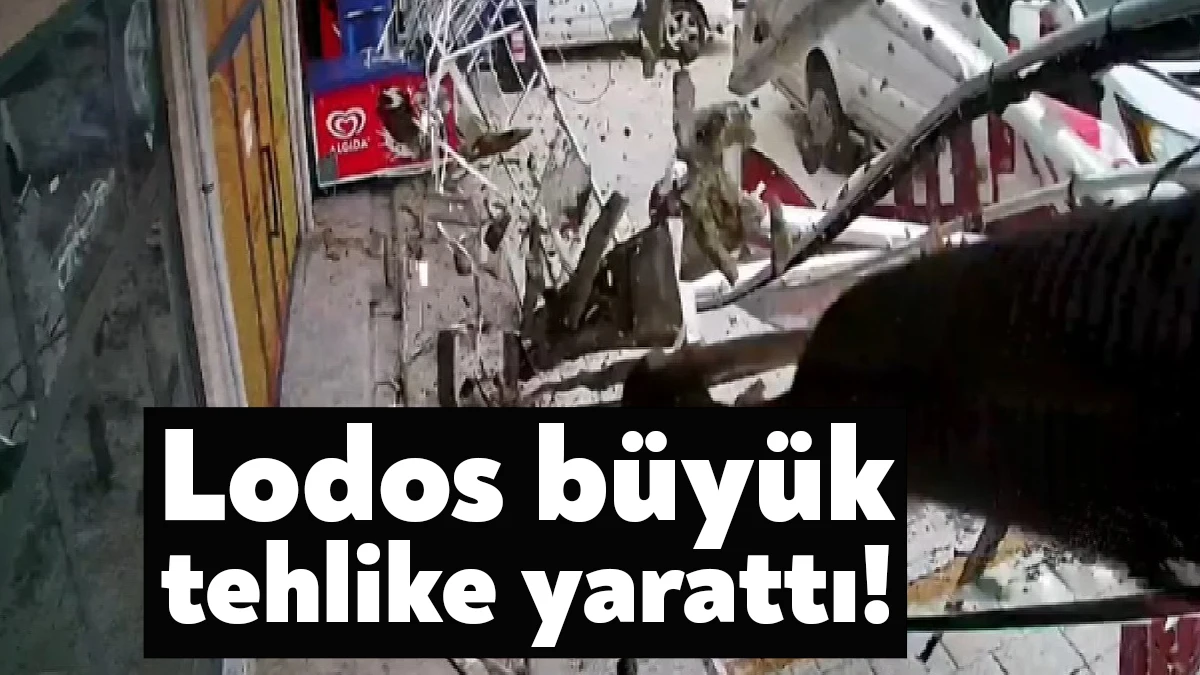 Kocaeli’de etkili olan lodos, yan yana bulunan iki işyerinin tabelalarını