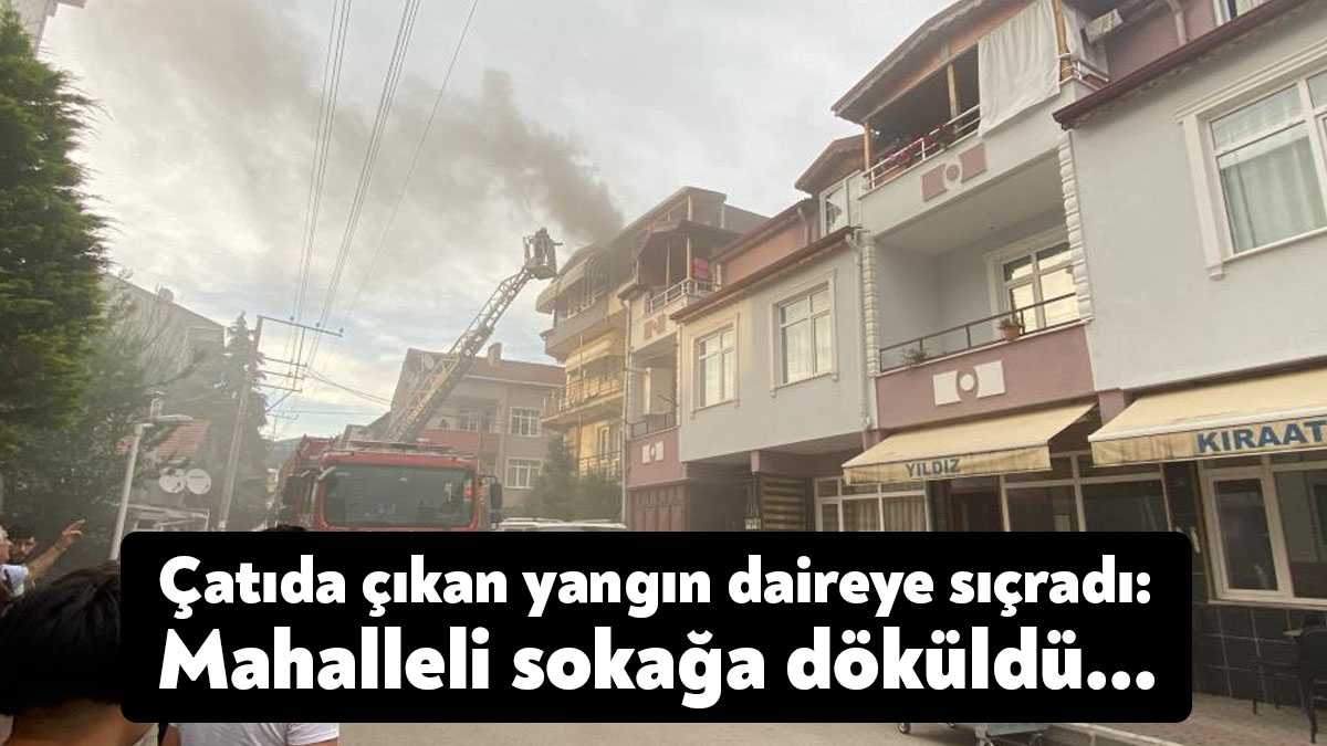 Kocaeli'nin Derince ilçesinde 4 katlı evin çatısında çıkan yangın altındaki