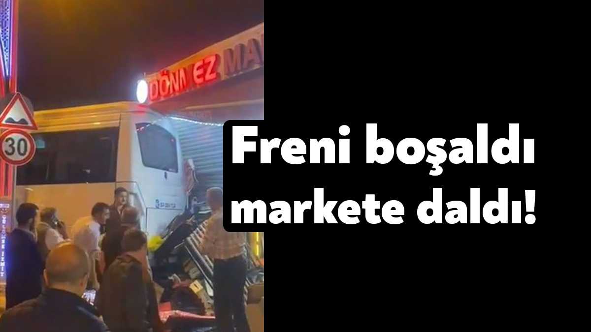 Kocaeli’de park halindeyken freni boşalan servis midibüsü markete çarparak durabildi.