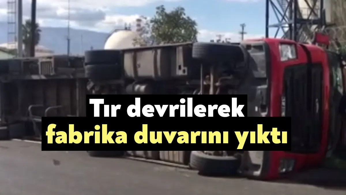 Kocaeli'nin Körfez ilçesinde virajı alamayan konteyner yüklü tır, fabrika