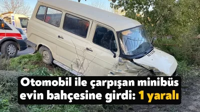 Kocaeli'nin Başiskele ilçesinde otomobil ile çarpışan minibüs bir evin bahçesine