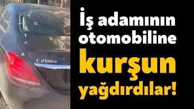 Kocaeli’de bir iş adamının lüks otomobiline, seyir halindeki başka araçlardan