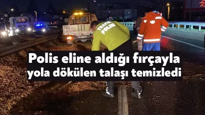 Kocaeli’nin Başiskele ilçesinde bir trafik polisi, eline aldığı fırçayla devrilen