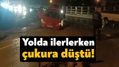 Kocaeli’nin Körfez ilçesinde seyir halindeki bir otomobil yolun bir kısmının