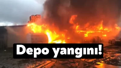 Kocaeli'nin Kartepe ilçesinde bulunan bir depo alev alev yanarken, siyah
