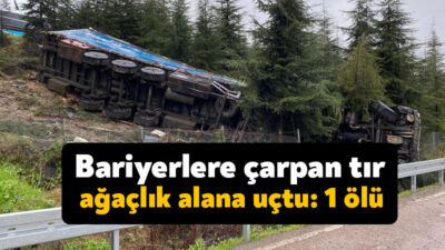Kocaeli'nin İzmit ilçesinde yağış sebebiyle kayganlaşan yolda sürücünün direksiyon hakimiyetini