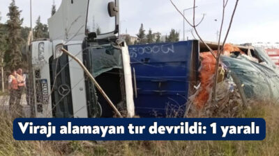 Kocaeli'nin Darıca ilçesinde virajı alamayarak devrilen tırda sıkışan sürücü, itfaiye