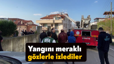 Başiskele'de 4 katlı binanın çatısında çıkan yangın itfaiye ekipleri tarafından