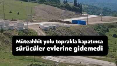 Kocaeli'nin Körfez ilçesinde müteahhittin yolu toprakla kapatması üzerine sürücüler evlerine