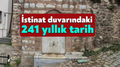  İzmit'te bir binanın istinat duvarına gömülü şekilde bulunan tarihi çeşme,