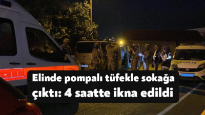 Kocaeli'nin Başiskele ilçesinde bir kişinin elinde pompalı tüfekle sokağa çıkması
